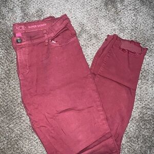 Super Skinny Jeans in a faded pink color